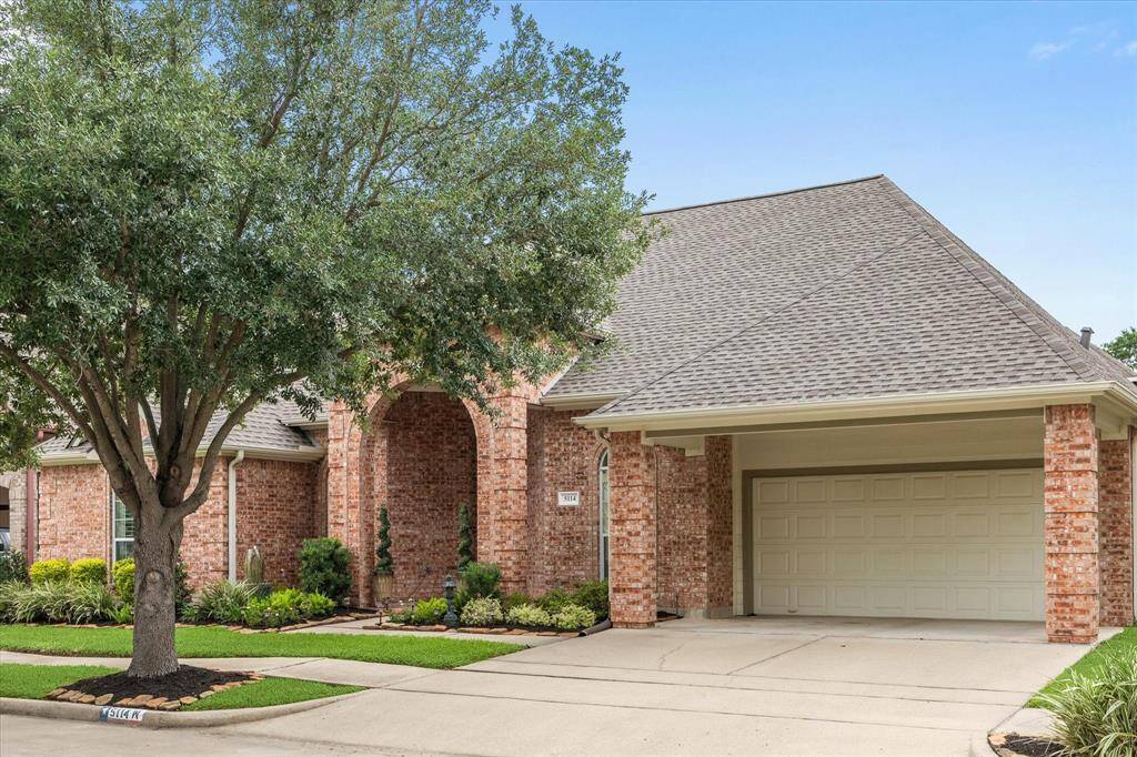 Not only does this property have a two car garage, but also a partially covered additional parking pad.