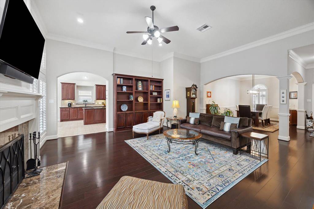 This spacious living/family room offers a variety of options for furniture placement.  As well there is the perfect spot in the built-ins with open and covered shelving, for books and decorative pieces.