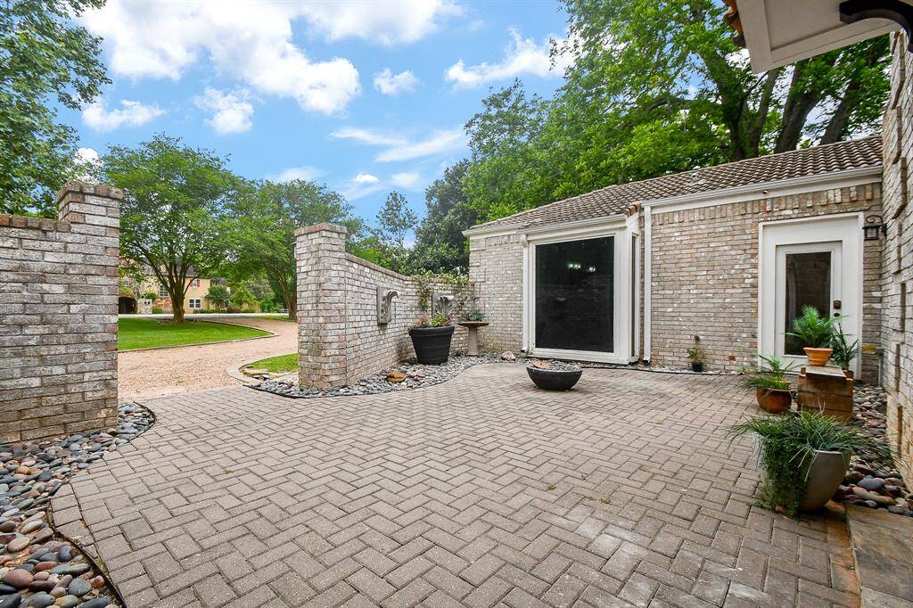 Primary bedroom opens to this beautiful courtyard