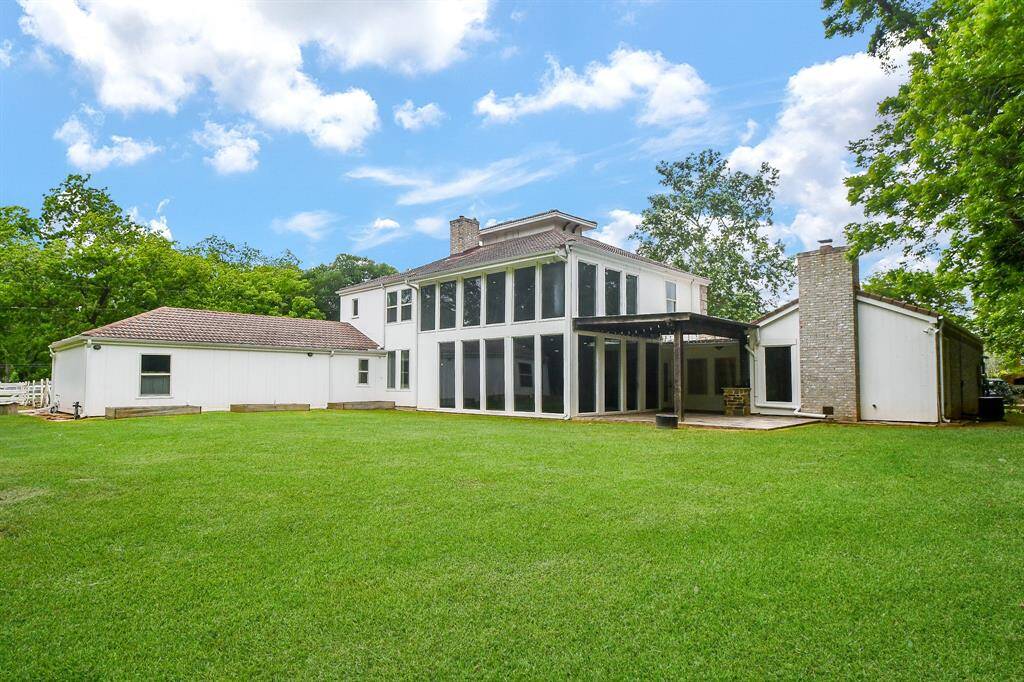 Rear view showing the impressive 2 story windows
