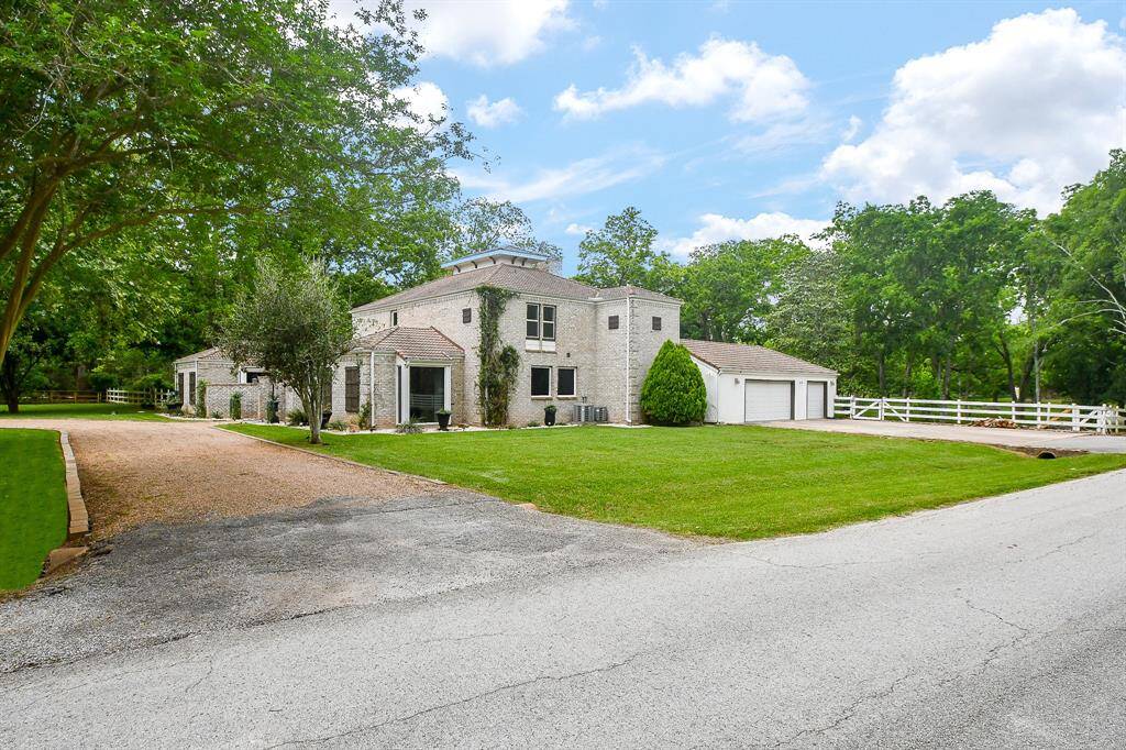 3 car attached garage and separate driveway