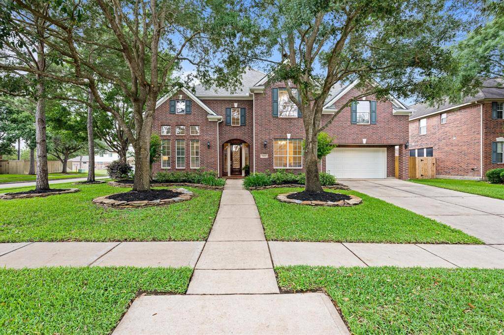 Welcome to 5222 Arcadia Glen Lane, a stunning and meticulously maintained residence situated on a spacious corner lot in the highly sought-after, master-planned community of Cinco Ranch West.