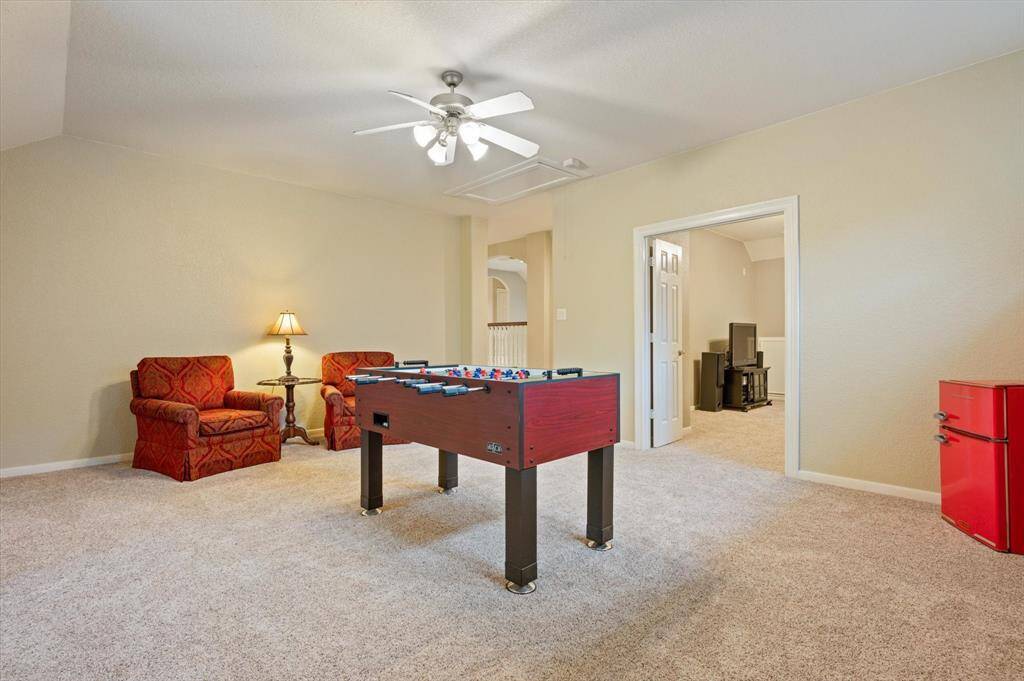 The room's generous size allows it to be easily customized to suit your family's needs—whether used as a playroom, media room, or even a home gym. With its flexibility and thoughtful design, this game room is a perfect addition to the home, ready to adapt to your lifestyle.