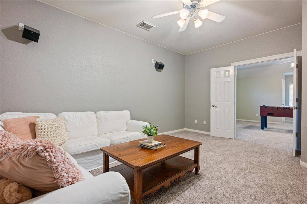 Whether you're hosting a film screening or enjoying a quiet night in, this dedicated space delivers a true cinematic atmosphere right at home.