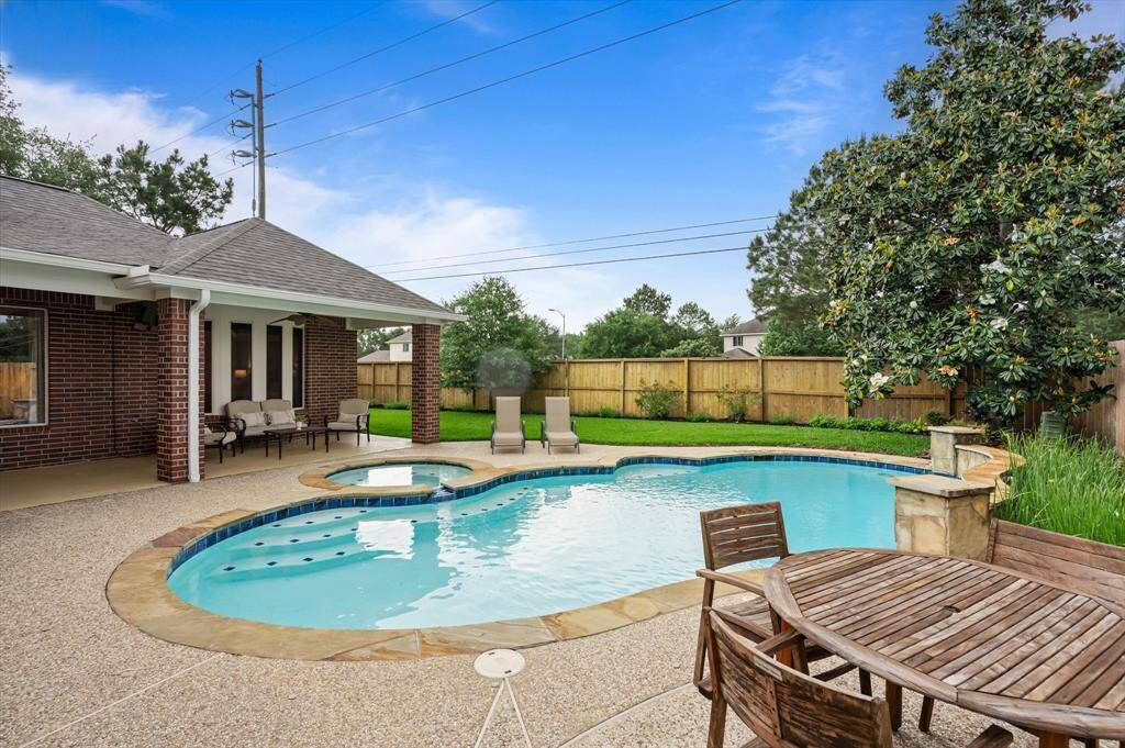 With its perfect blend of beauty and functionality, this outdoor retreat is sure to be a favorite gathering spot year-round.