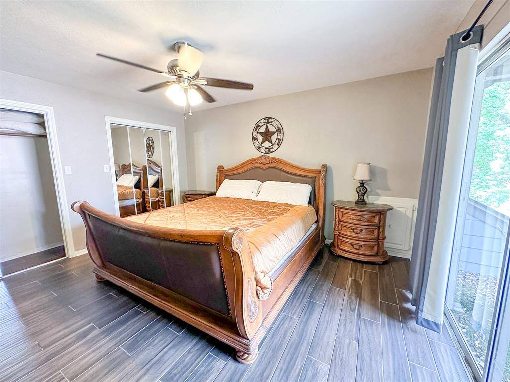 This secondary bedroom has a balcony