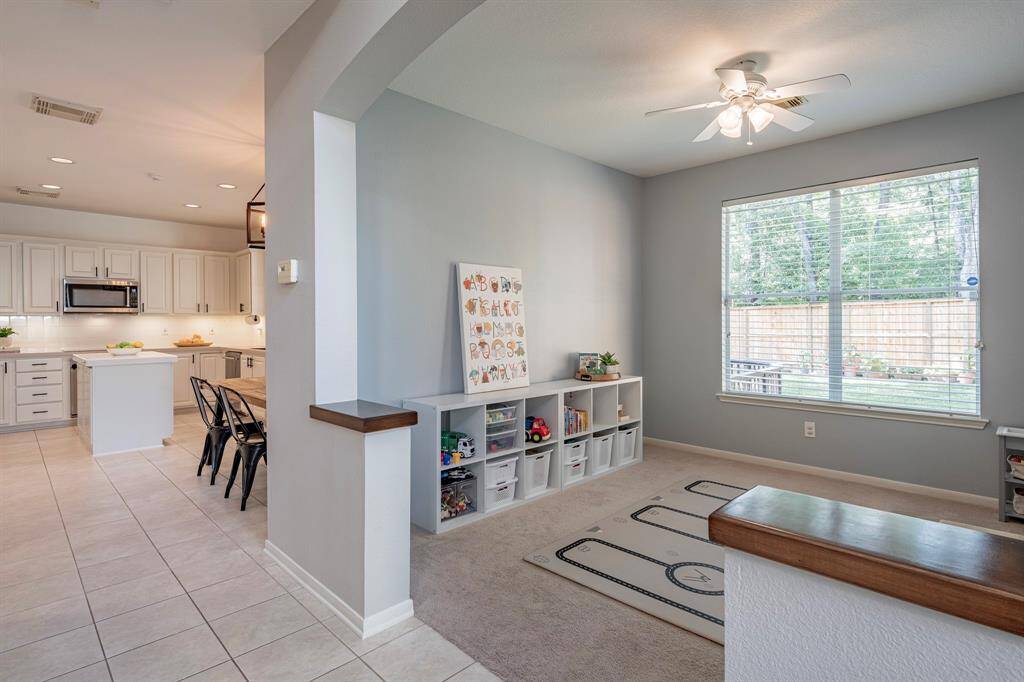 This flex room has been used as a formal dining, an office study and currently as a playroom! As a playroom, the room is within earshot and easy sight of the kitchen.