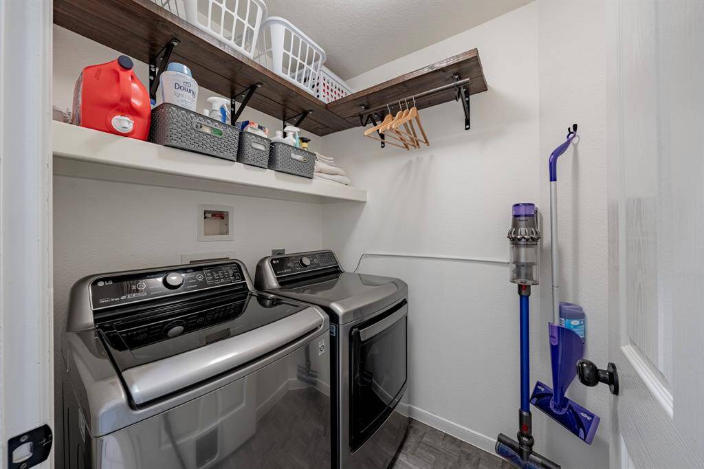 Spacious and organized laundry room.
