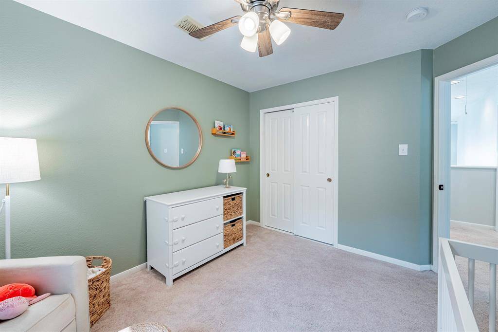 Another view of this bedroom and its spacious closet.