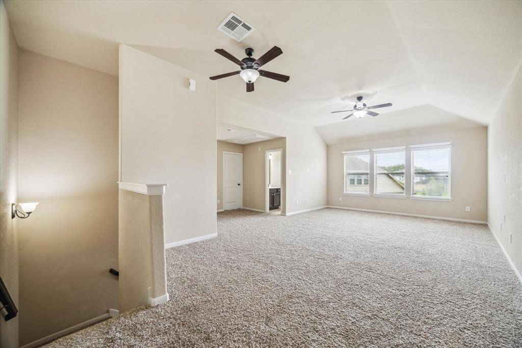 It's all fun and games with this supersized game room! What a great spot for summer slumber parties and family game nights.