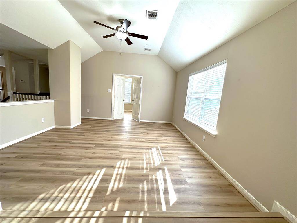 Another view of the large game room, facing the office/study room with double doors.