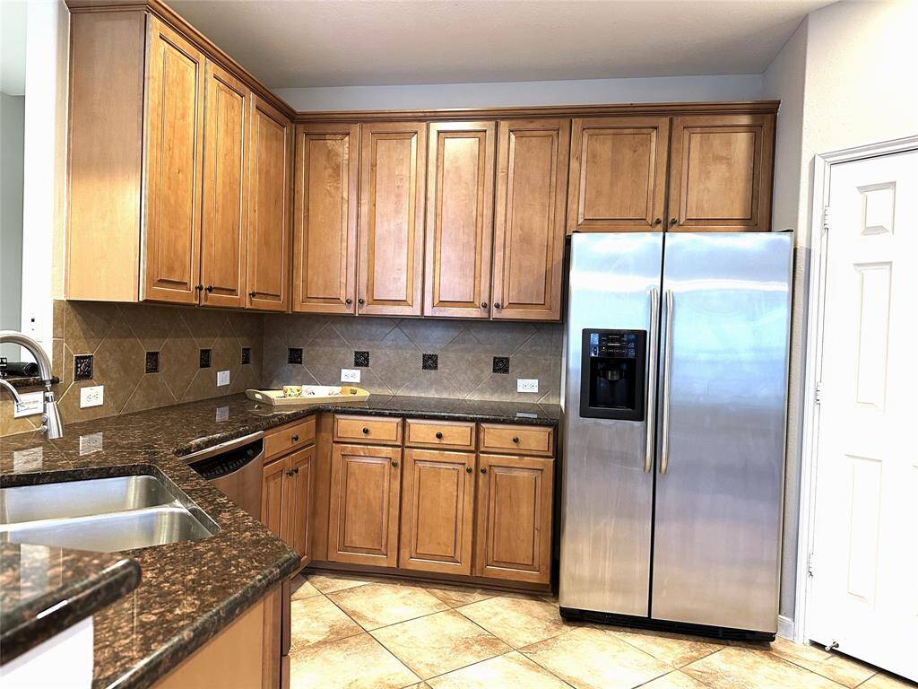 Gourmet kitchen with granite countertop