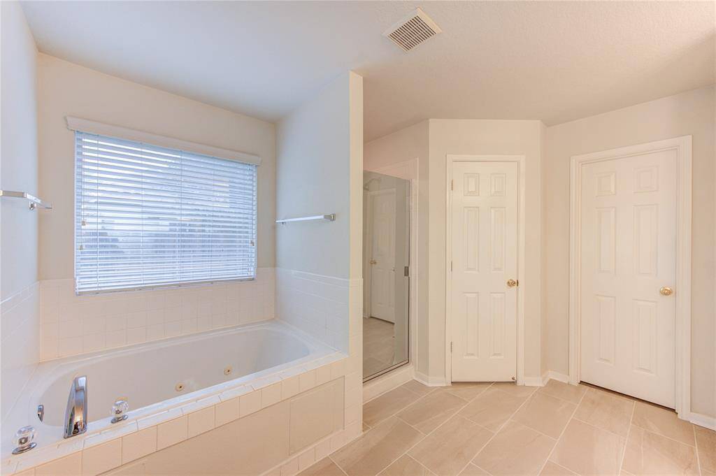 With a jetted soaking tub