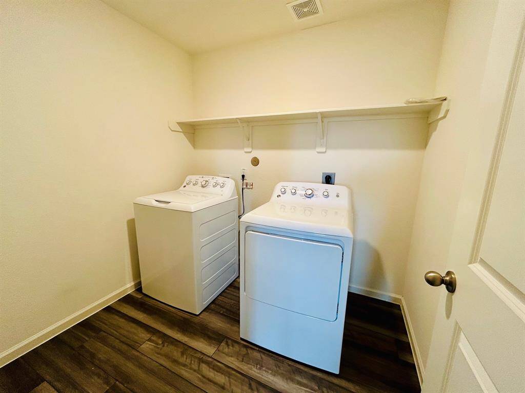 Washer and dryer included.
