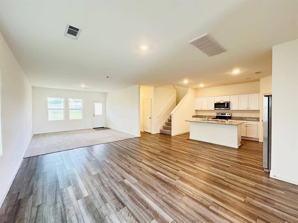 Living room and kitchen view.