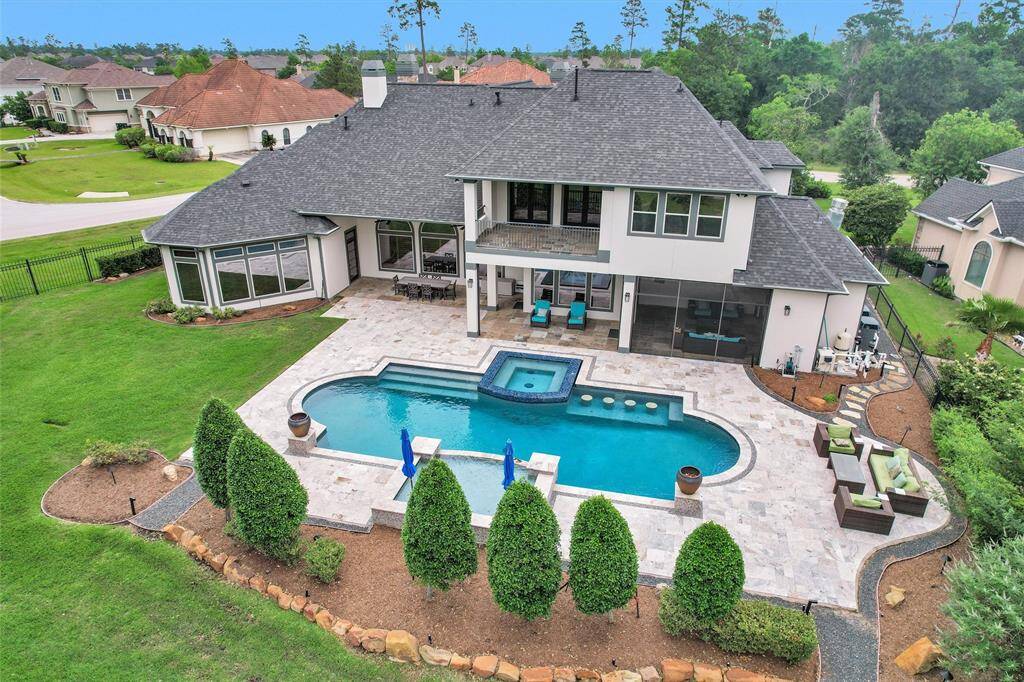 This backyard paradise is a showstopper from every angle. Entertain, unwind, and soak in the luxury of your private pool, spa, and covered outdoor living spaces—all with a view.