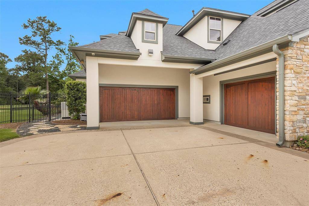 The side-entry garage offers a clean and elegant look while providing plenty of space for parking, storage, and projects.