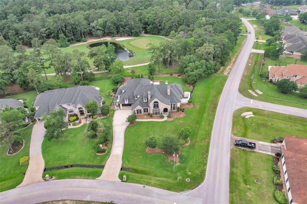 Nestled on the golf course with no back neighbors, this oversized lot offers both privacy and stunning views of nature and fairways alike.