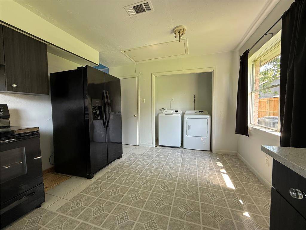 Kitchen and washer & dryer area