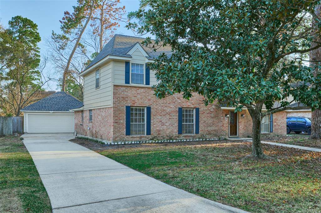 Westador beauty with single wide drive to 2 car garage.