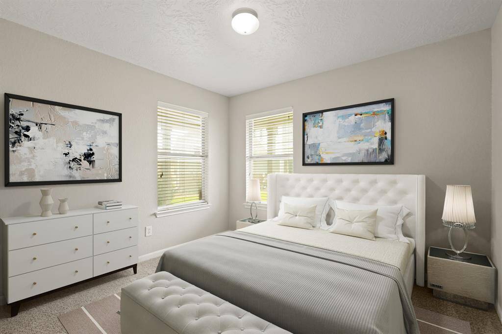 Virtually Staged: Secondary bedroom with carpet floors, and windows with privacy blinds.