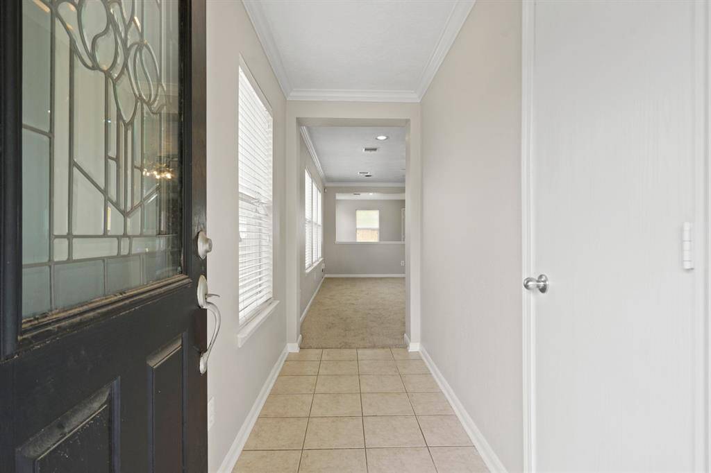 You'll be instantly greeted by tile floors.