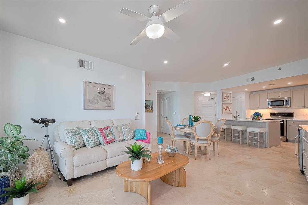 10 FT CEILINGS IN THE DEN, BREAKFAST AND KITCHEN AREA.  LOTS OF DECORATOR TOUCHES, TRAVERTINE FLOORING AND UPGRADED LIGHTING.