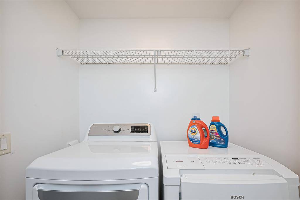RECENT WASHER AND DRYER CONVEY WITH THIS BEAUTIFUL CONDO.
