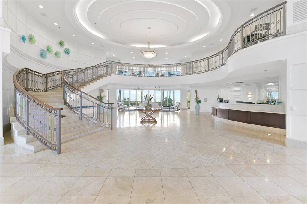 Grand entry and lobby with 24/7 concierge and security.
