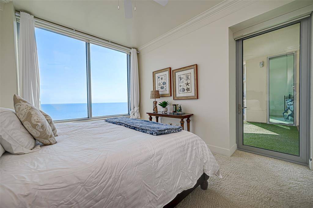 Giant master with Basset furniture, drapes and blackout shades, en suite bath, crown molding, solid core doors, carpet and beautiful views out your giant bedroom window with jaw dropping views!