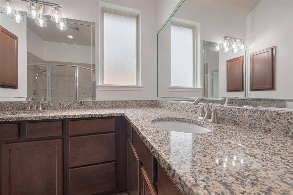 Primary Bathroom with dual sinks.
