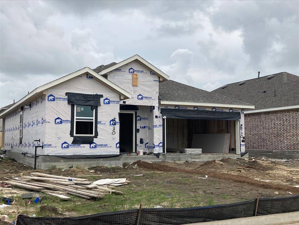 One story home with 3 bedrooms, 2 baths, and 2 car garage.