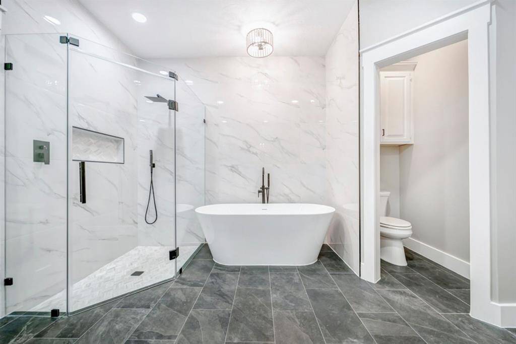 This beautiful soaking tub and walk-in shower have never been used!  Brand new for the new home owner.