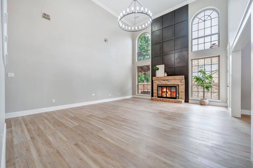 New floors, pain, trim and lighting!