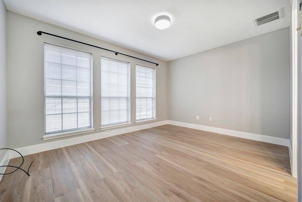Upstairs find one of two bedrooms connected by a Jack and Jill bathroom with private sink areas