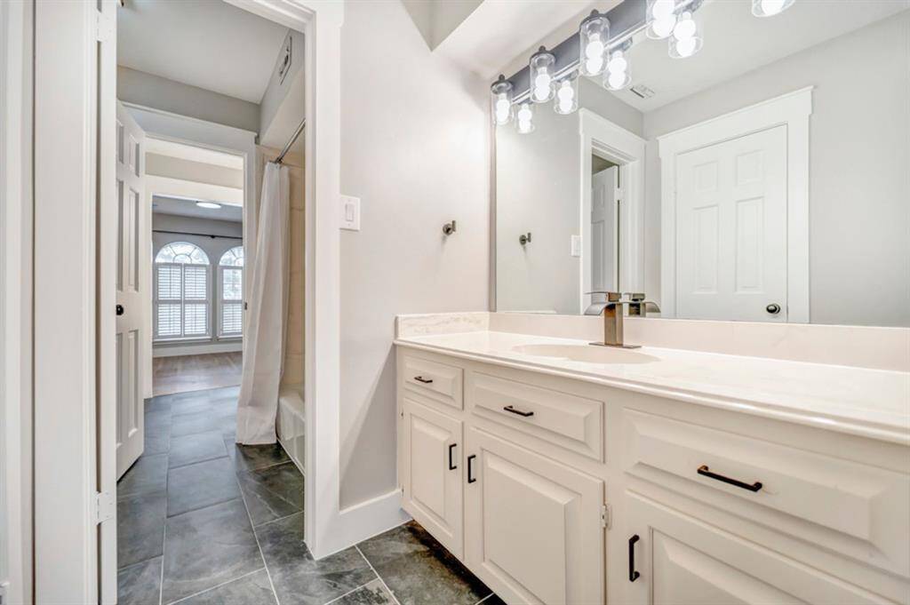 Private sink area with new plumbing fixtures and lighting