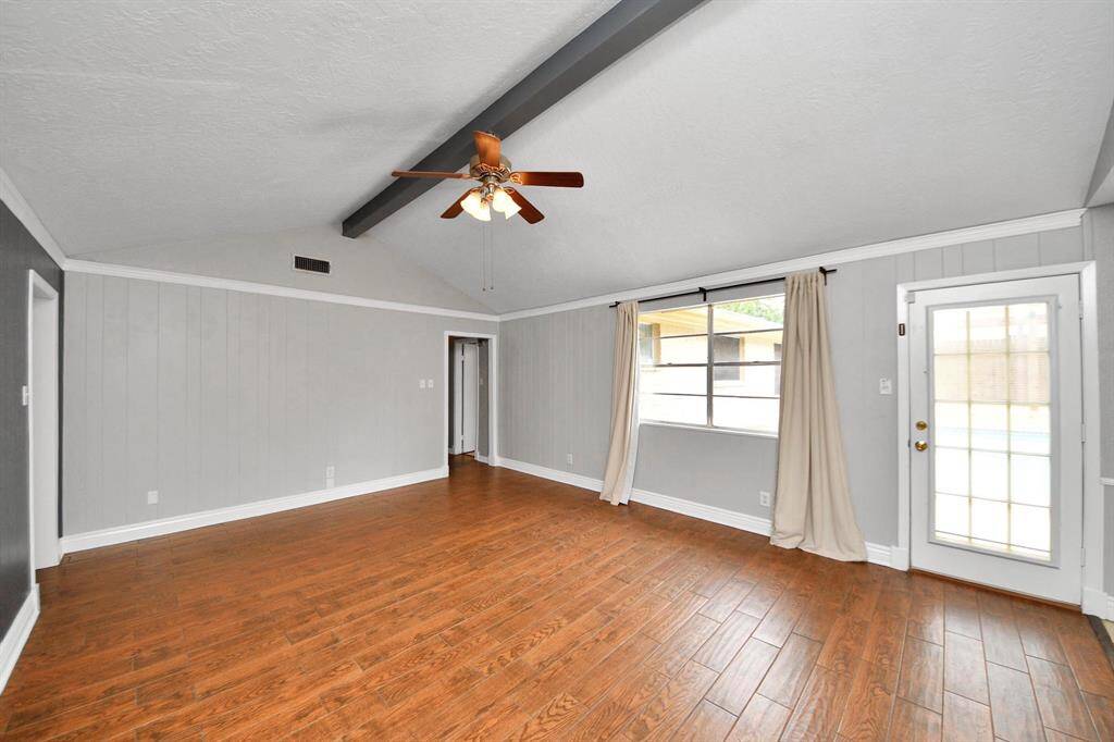 Enjoy stunning pool views from the inviting family room.
