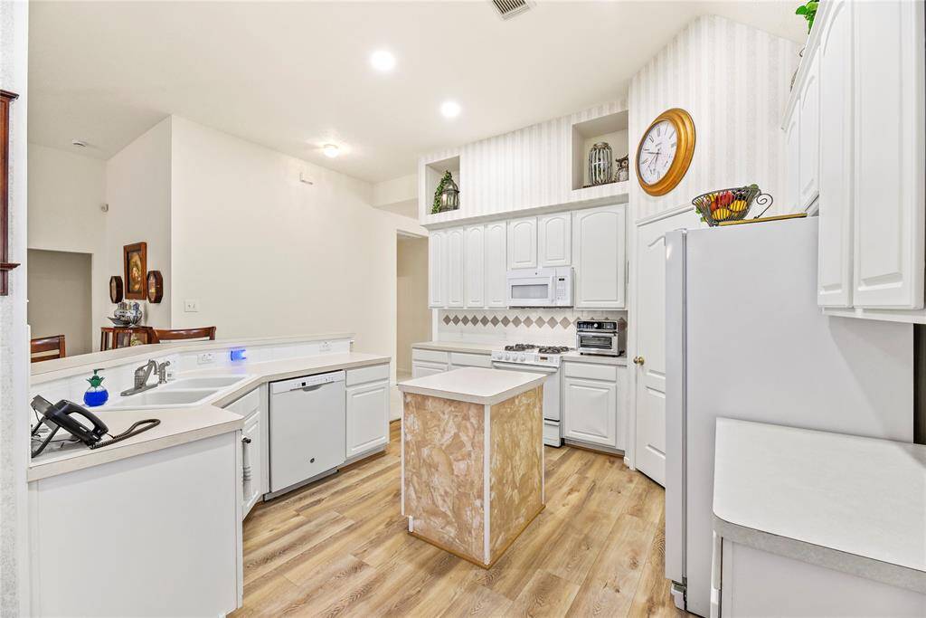 Kitchen with high ceilings and ample counter space