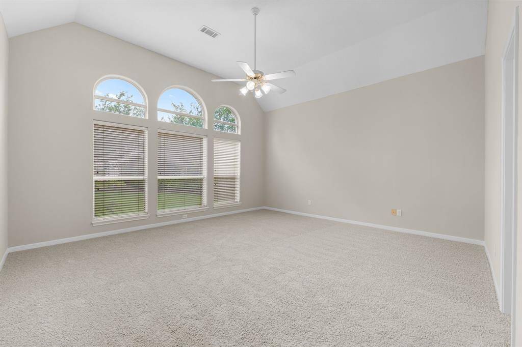 Spacious primary retreat with fresh paint and New carpet with ceiling fan that is ready for your personal touch. Zoned AC added in Spring of 2024 controls the primary bedroom, bath and second full bath only.