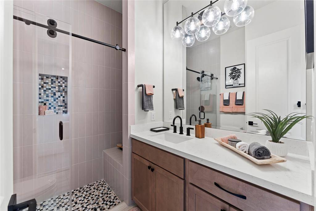 Bath 3 Features a Standing Shower with Seat