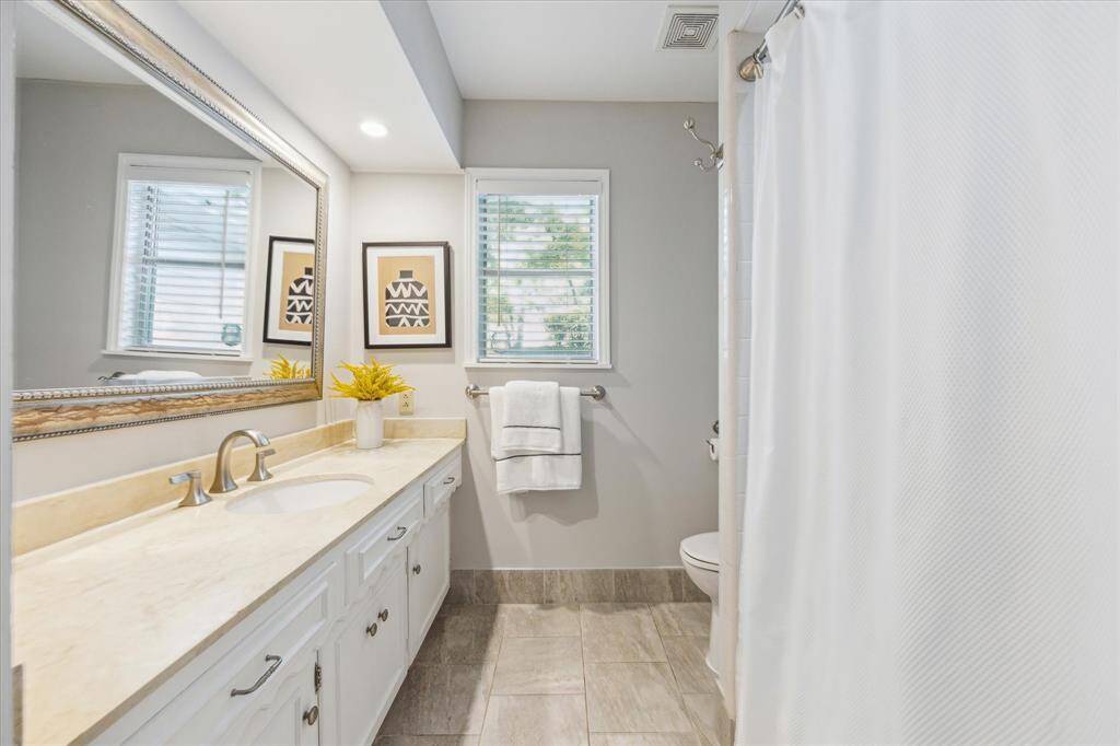 Hall bathroom has bathtub/shower combo.