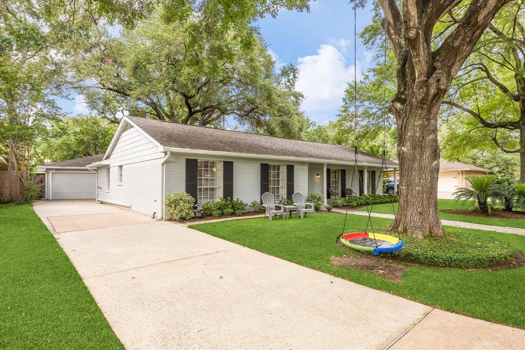 Gorgeous tree-lined street is welcoming and provides lots of shade for playing, neighborhood walks, or socializing with friendly neighbors.