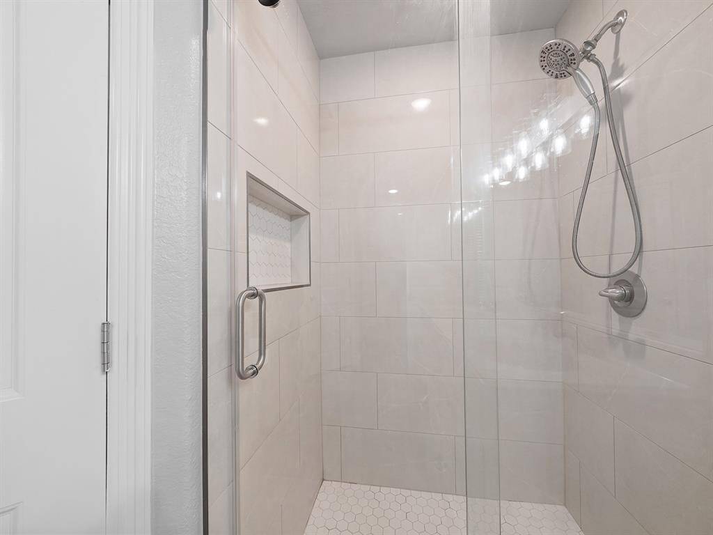RECENTLY UPDATED PRIMARY BATHROOM SHOWER.