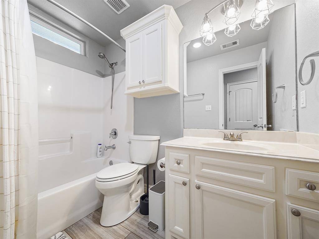 SECONDARY FULL BATH WITH TUB-SHOWER COMBO.