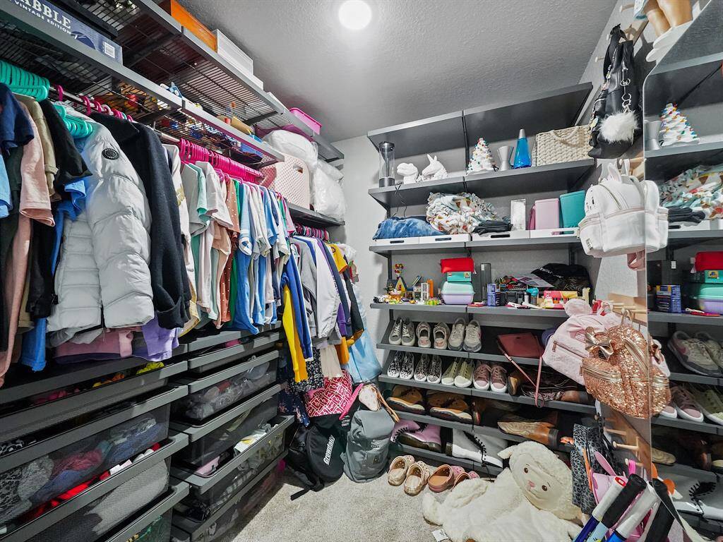 THE 2nd PRIMARY BEDROOM ALSO FEATURES THIS AMAZING SPACIOUS CLOSET!