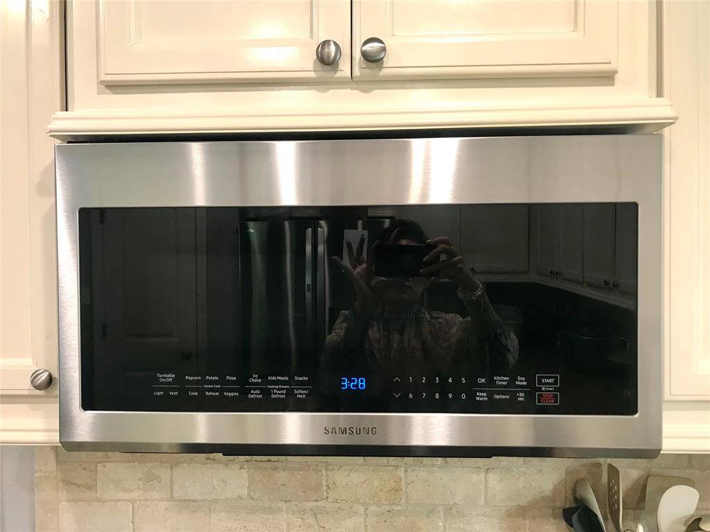 Large stainless steel microwave.