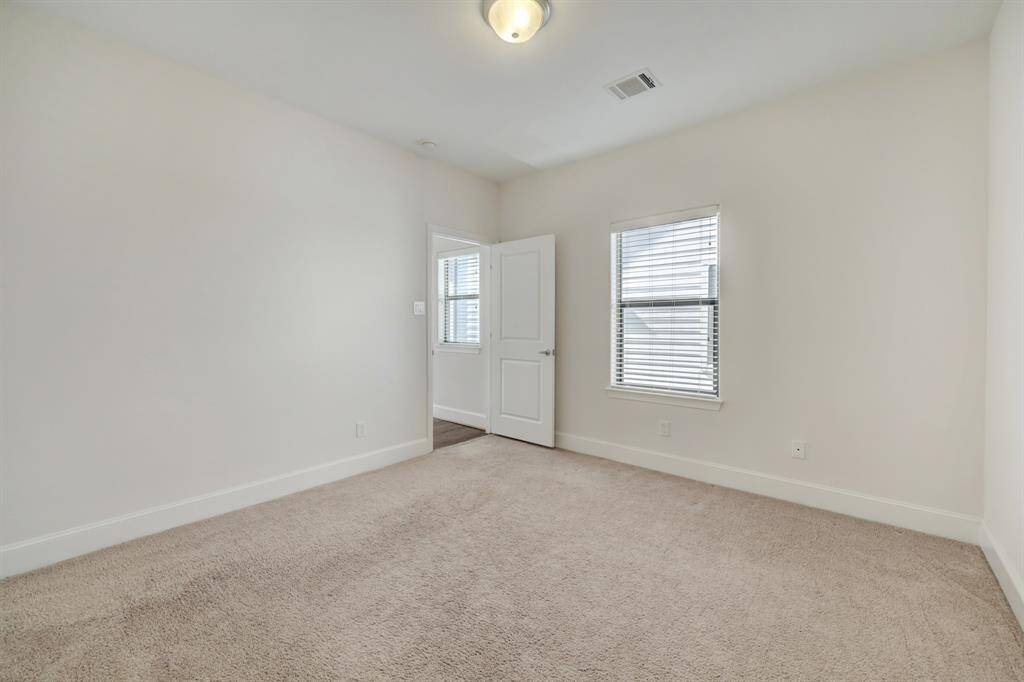 Secondary bedroom on 3rd floor.