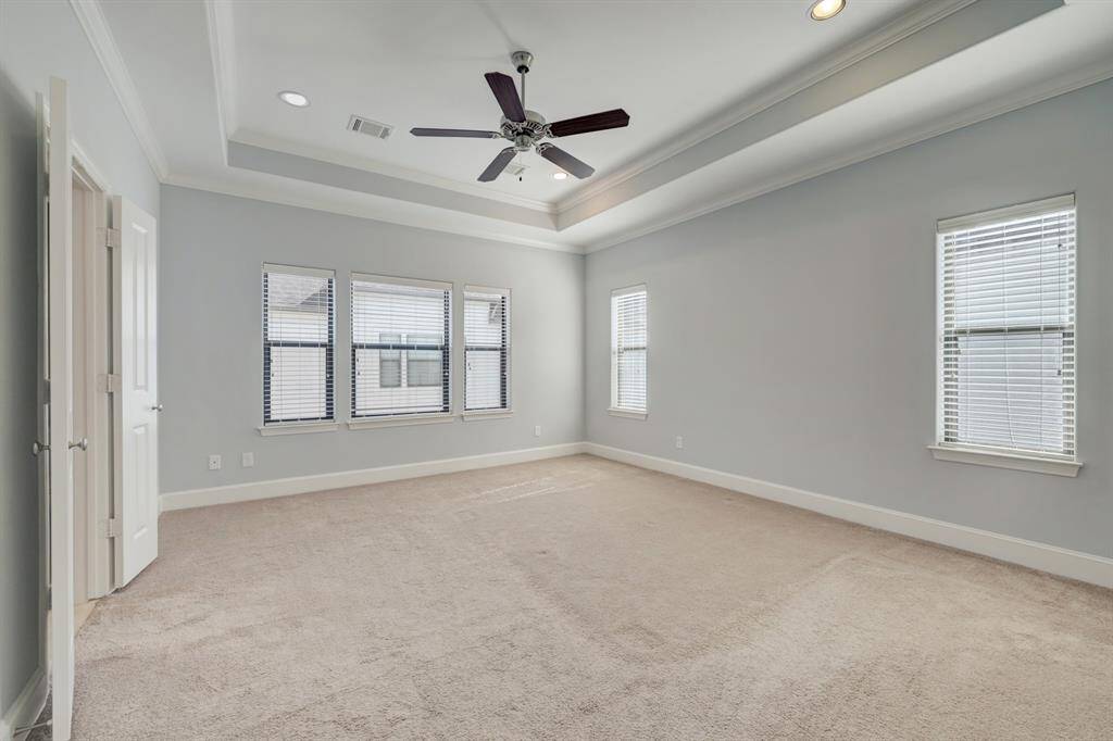 Primary suite is on the third floor  with lots of natural light.