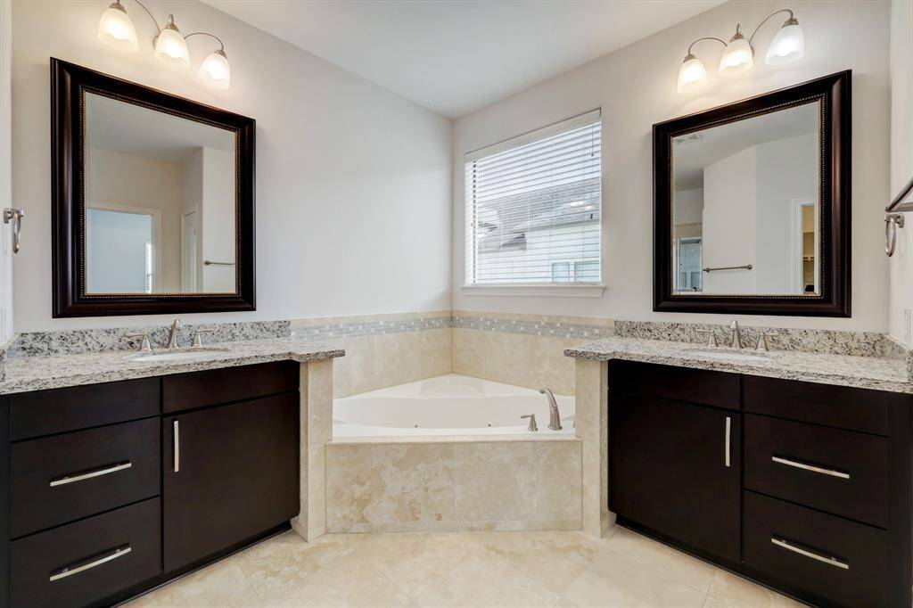 Primary bathroom suite.