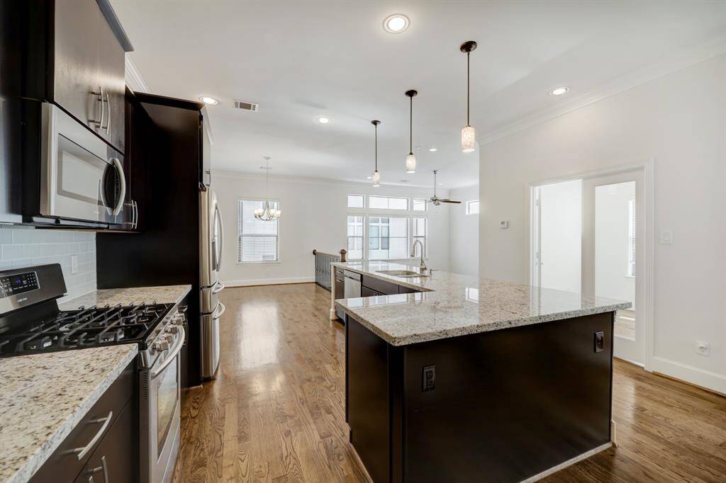 Stainless appliances, lots of cabinets and lots of light.